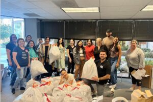 volunteers attended Women4Women Tempe packing party at Phillips Law Group