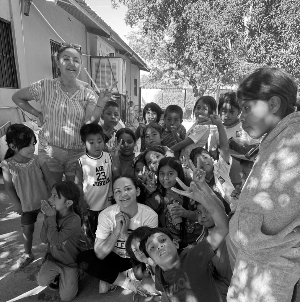 group photo of kids being sponsored as part of the holiday toy drive