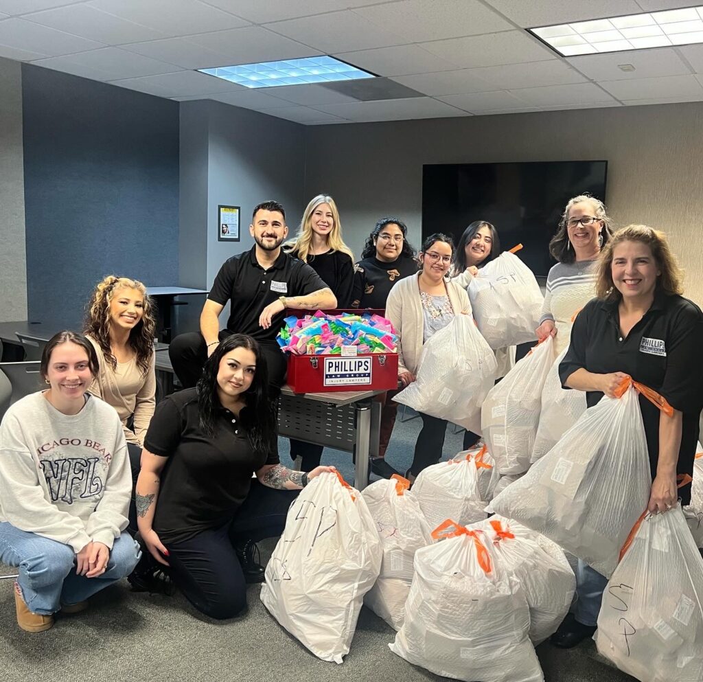 group photo of volunteers for women4women tempe first packing party of 2024 blog