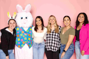 image of phillips law group team members with easter bunny