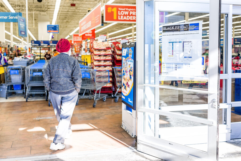 person walking into store for walmart class action settlement blog