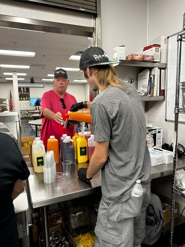 veteran being served brunch at mana house