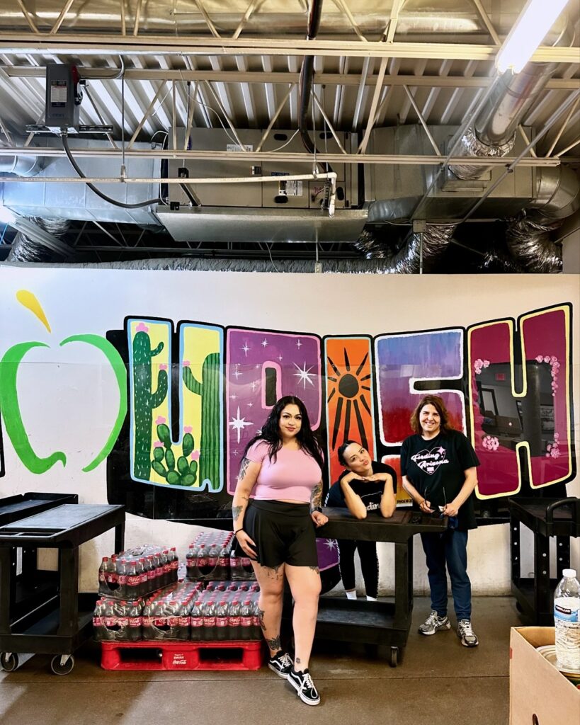 three volunteers at nourishphx
