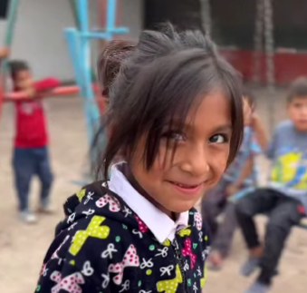 photo of little girl for 2024 Holiday Fundraiser Campaign blog post