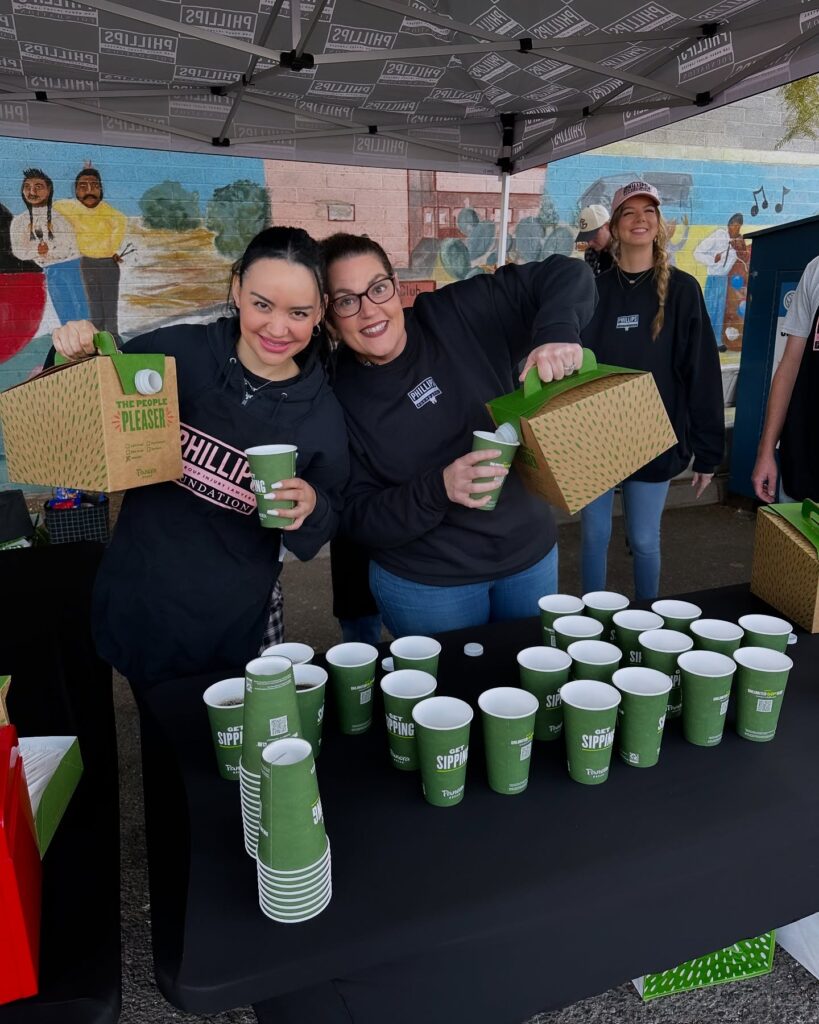 volunteers handing out coffee at feeding arizona
