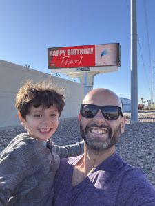 Nasser Abujbarah, Managing Attorney at Phillips Law Group, with his child