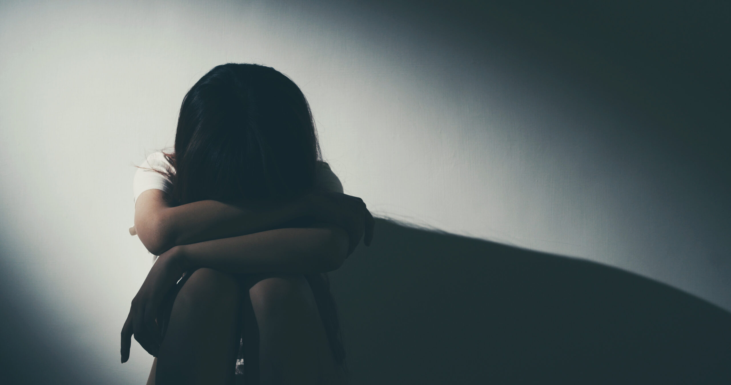 sad woman seated