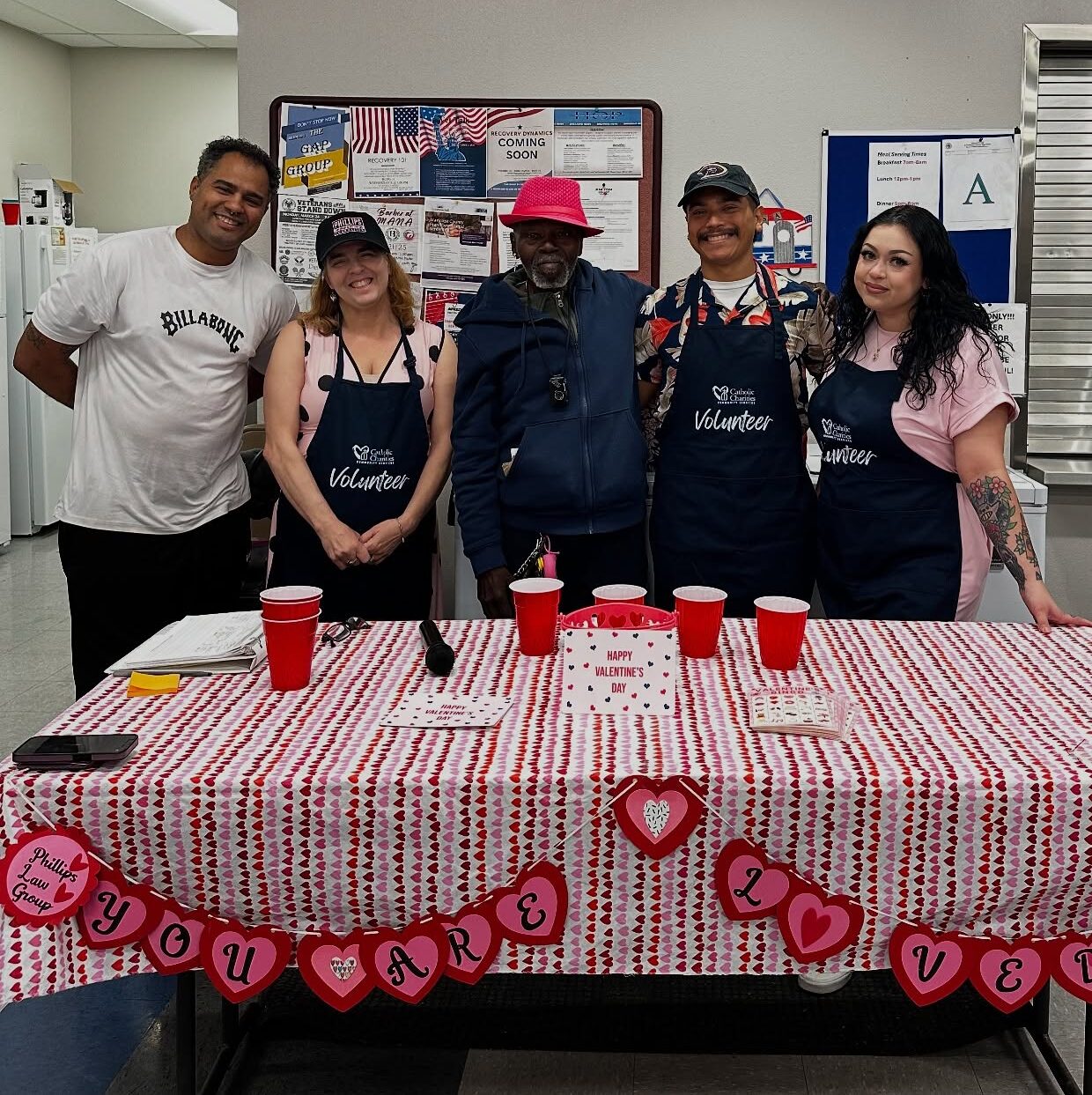 image of volunteers at mana house for february community service events blog post