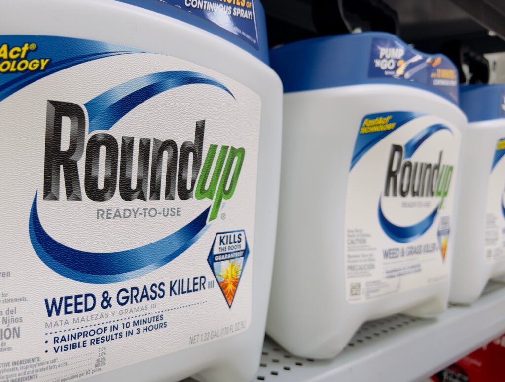 bottle of roundup on a store shelf