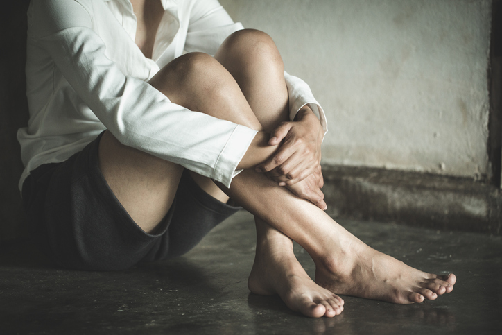 woman sitting on the floor