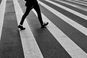 pedestrian crossing the street