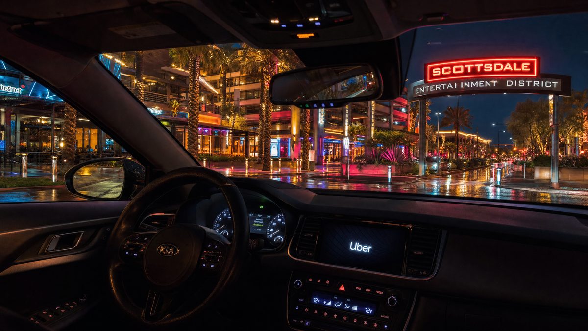 Rideshare vehicle parked at night in Scottsdale Entertainment District