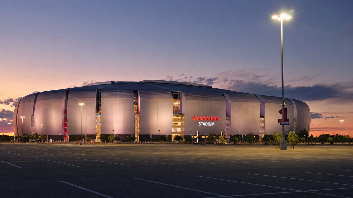 Exterior view of large sports stadium in Glendale Arizona at dusk