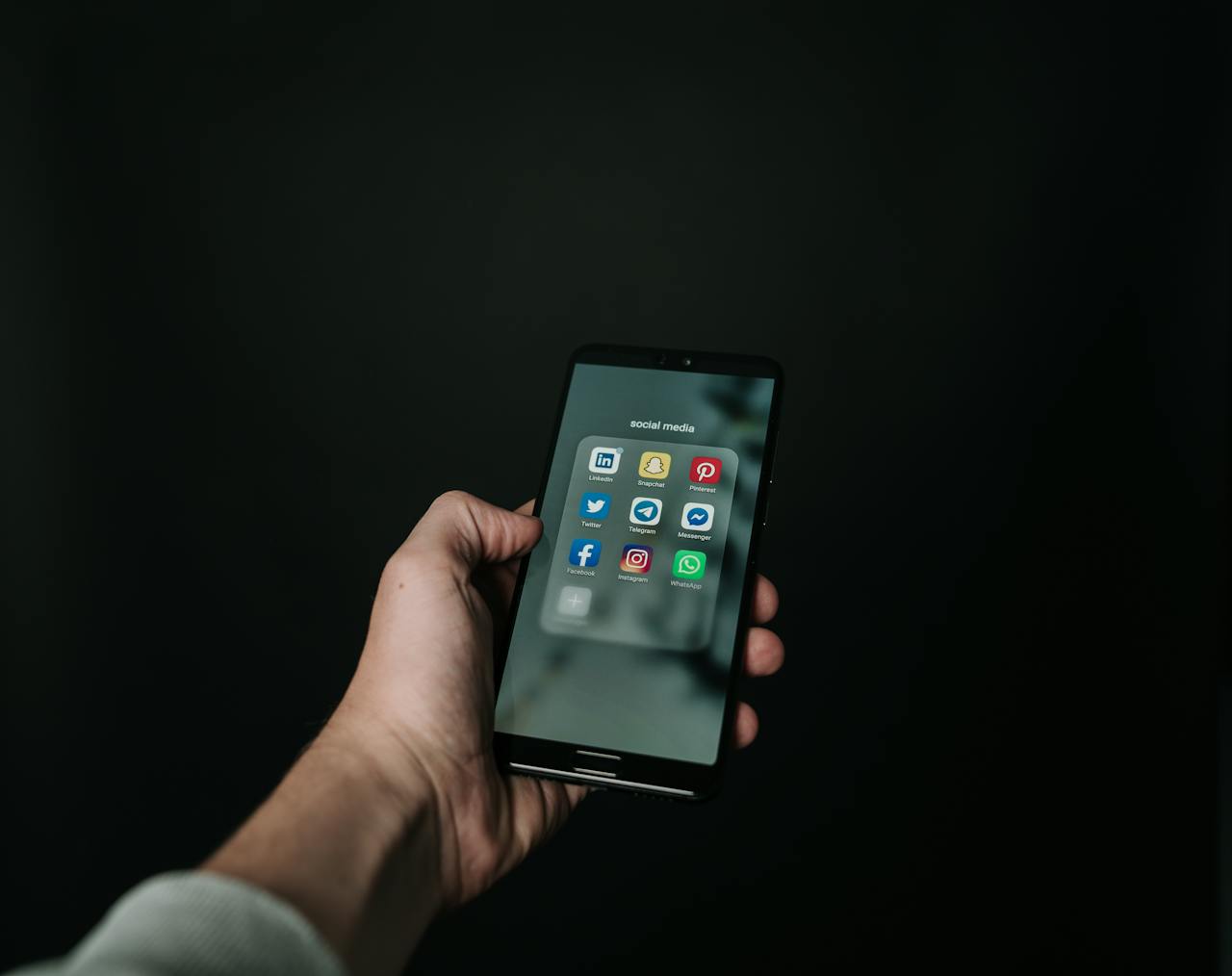 phone with social media icons