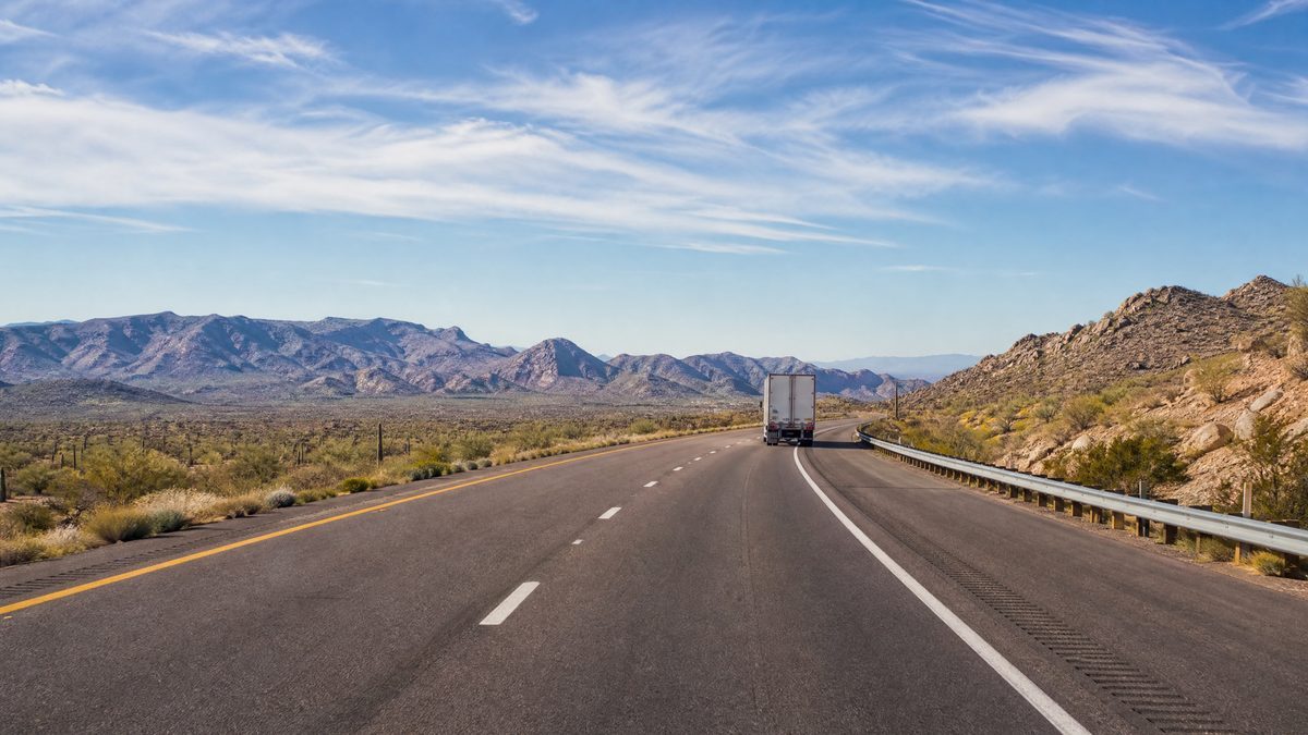 Who Is Responsible After a Commercial Delivery Vehicle Collision on a Phoenix Freight Route?