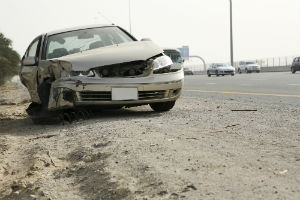 smashed car on interstate