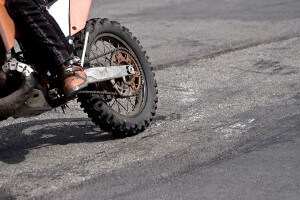 dirt bike wheels on city pavement