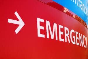 closeup of emergency room sign