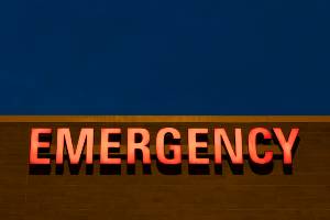 emergency sign on top of medical building