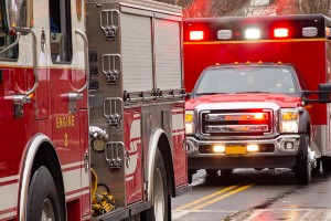 fire truck and ambulance at crash scene
