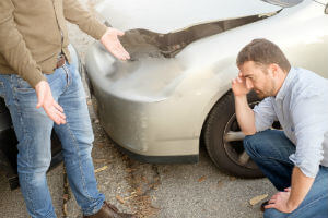 assessing the damage after a car accident