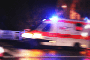 Stock image of ambulance racing to scene of emergency