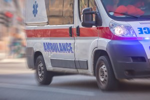ambulance transporting pedestrian in critical condition 