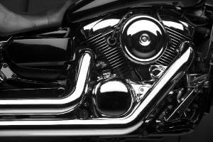 side shot of side of motorcycle engine