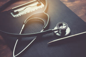 stethoscope and insurance claim form
