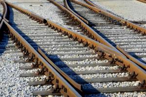 train tracks over gravel