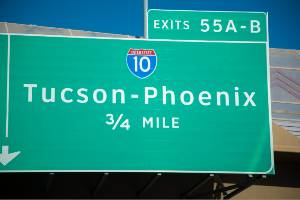 green sign for exit to tucson-phoenix