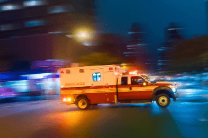 Stock image of ambulance racing to scene of emergency