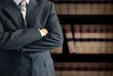business-litigation-lawyer-with-law-books